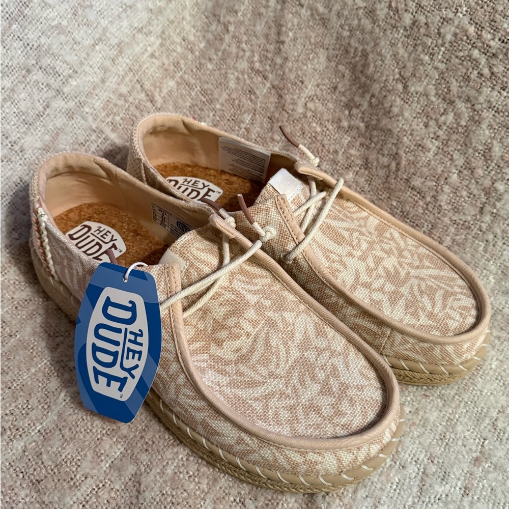 Woman’s Hey Dude size 11 Light Tan Patterned Loafers